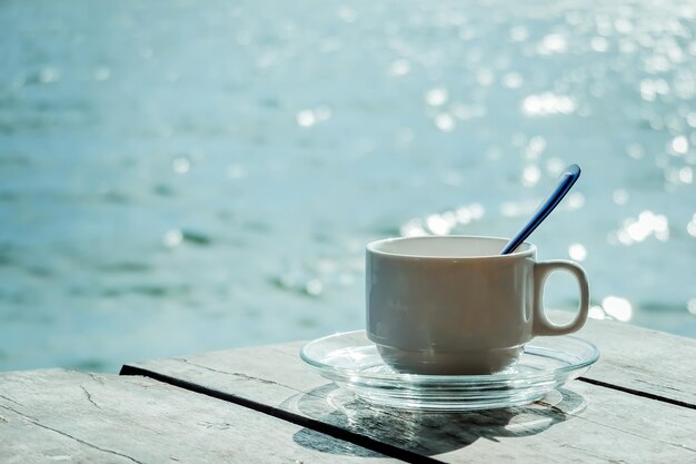 Close-up of coffee cup on table