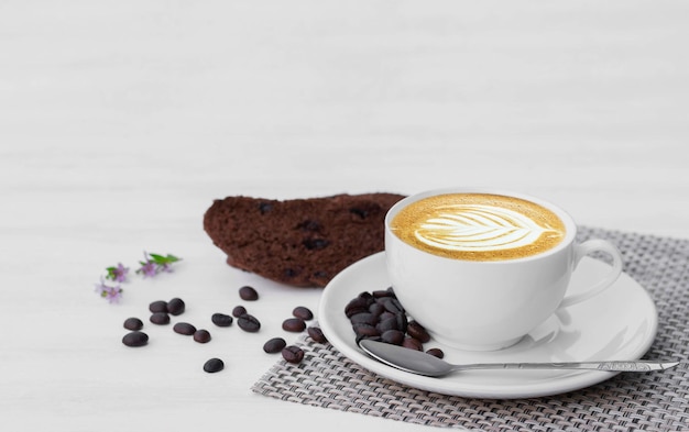 Close-up of coffee cup on table