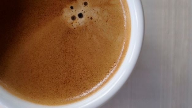 Close up Coffee froth on a hot coffee cup Ready to drink hot cofffee