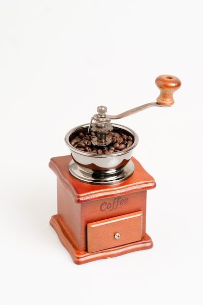 Close up coffee grinder on white background.