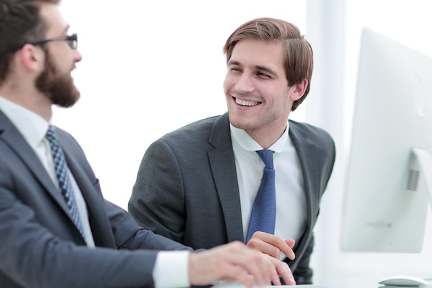 Close up colleagues discuss working issues