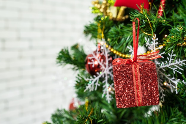 Close up of Colorful balls on Green Christmas tree. Decoration During Christmas and New Year.