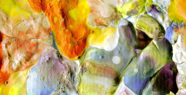 A close up of a colorful painting with the words'art of the universe'on it