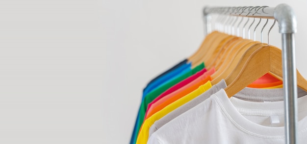 Close up of Colorful t-shirts on hangers