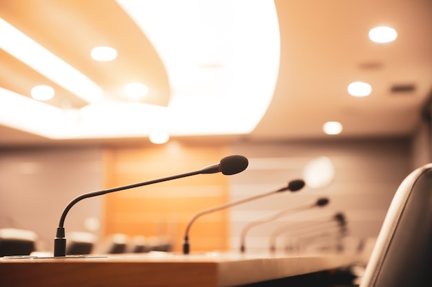 Close up the conference microphone on the meeting table.