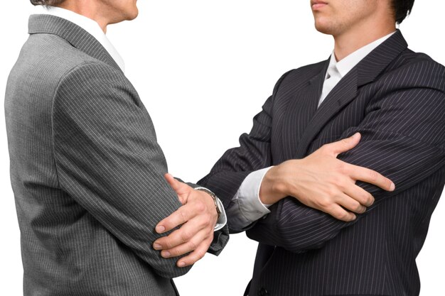 Photo close up confident businessmen in black elegant business suits with crossed arms