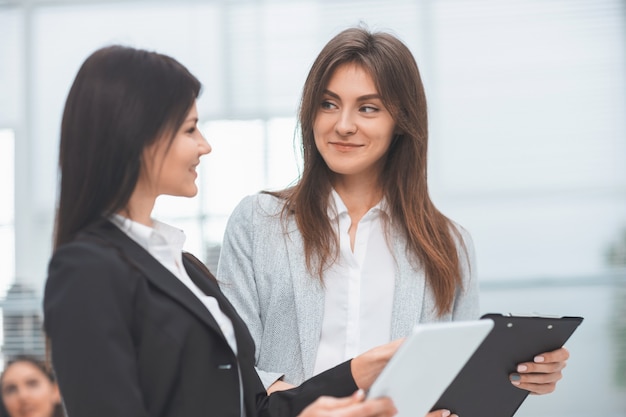 Close up consultant discussing a business document with the client