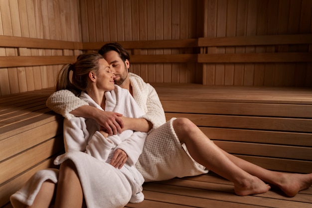 Close up on couple relaxing in the sauna