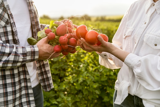 Close-up couple with vegetables