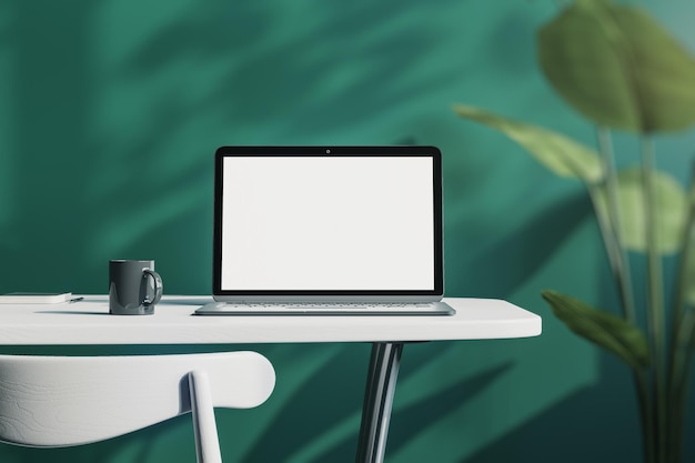 Close up of creative designer office desktop with empty white laptop screen