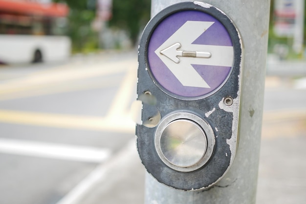 Close up of crossing signal button in singapore