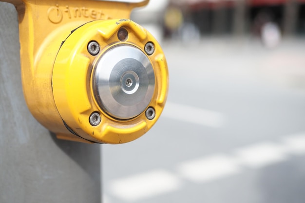 Close up of crossing signal button in singapore