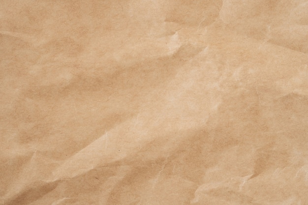 Close up crumpled brown paper texture and background with copy space