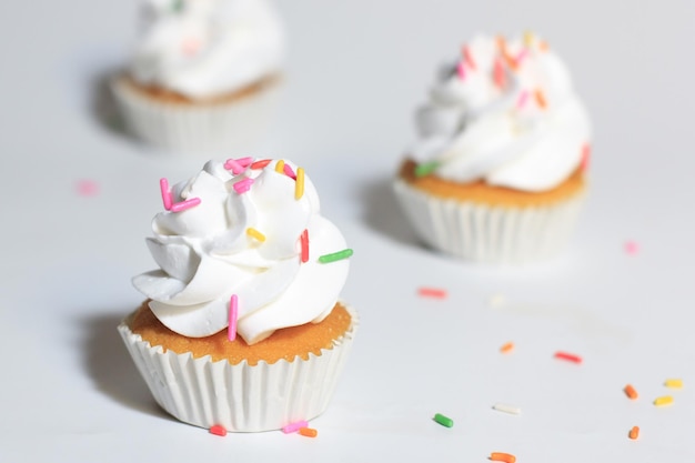 Close-up of cupcakes on cake