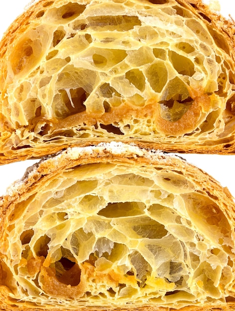 Close up the cut of the croissant puff pastry macro background