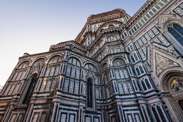 Close up detailed view of facade of famous Duomo catholic cathedral in historic city Florence Italy