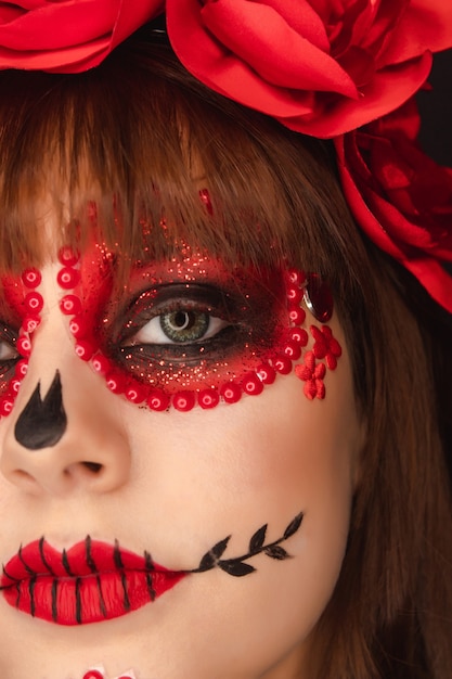 Close up of the details of a young girl's Dia de los Muertos makeup.