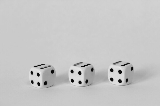 Photo close-up of dice over white background