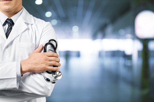 Close-up Doctor with stethoscope at hospital