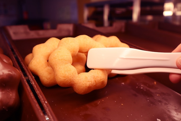 Close-up of doughnut in display at supermarket