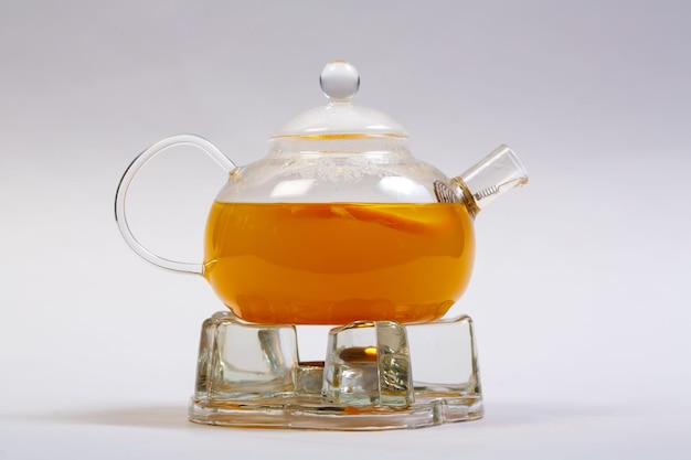 Photo close-up of drink on table against white background