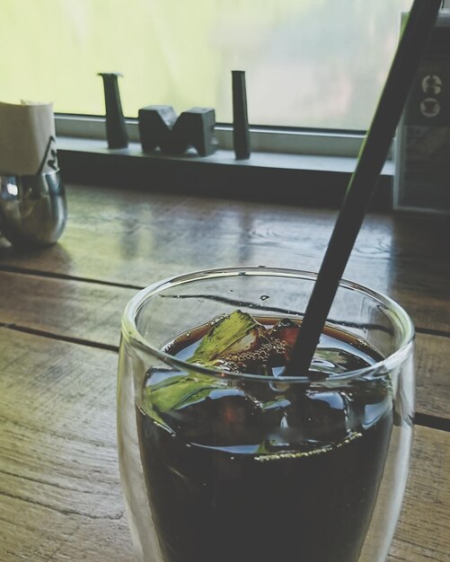 Photo close-up of drink on table