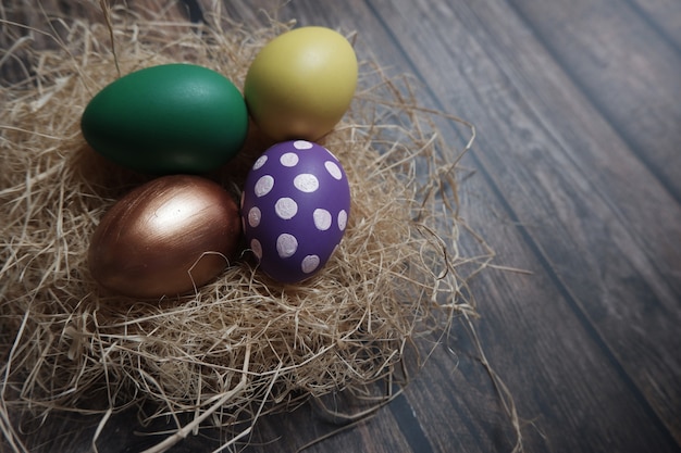 Close up Easter eggs on wooden table.