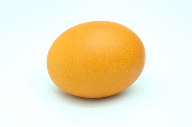 Close-up of egg on white background