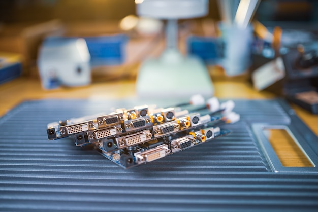 Photo close-up electric green embedded microcircuits in production