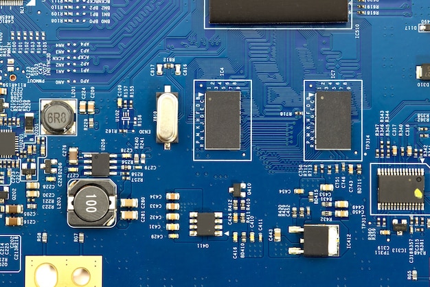 close-up of electronic circuit board with processor background