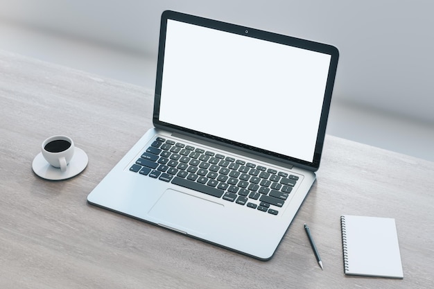 Close up of empty white laptop on wooden desktop with coffee cup notepad pen mock up place on screen blurry background 3D Rendering