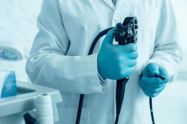 Photo close up of an endoscope in hands of a medical worker stock photo