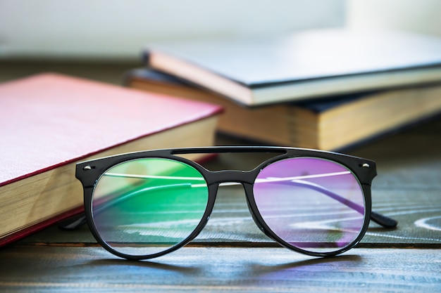 Close up Eye glasses and books