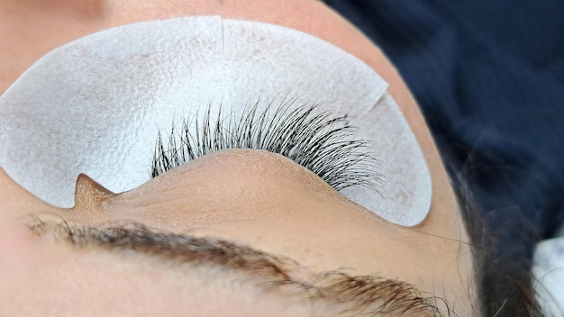 Close up of eye with eyelash extension macro viewbeauty salon treatment