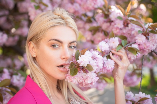 Close up face of spring girls in flowers