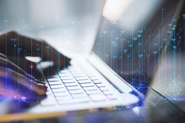 Close up of female hands using laptop keyboard with abstract polygonal lines on blurry background Big data index technology metaverse and future concept Double exposure