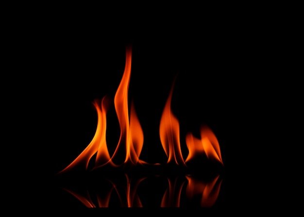 Photo close-up of fire against black background