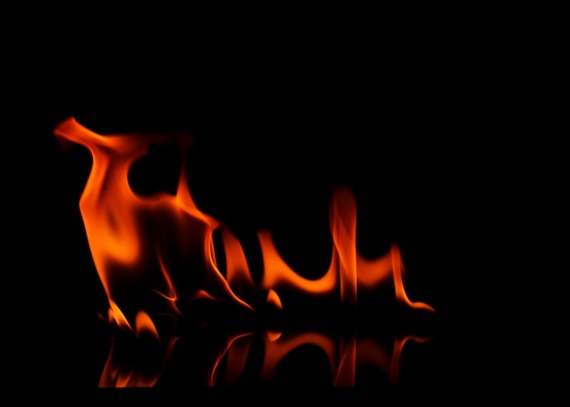 Photo close-up of fire against black background