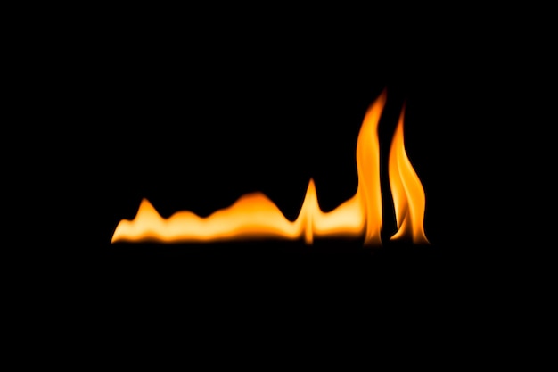 Photo close-up of fire against black background