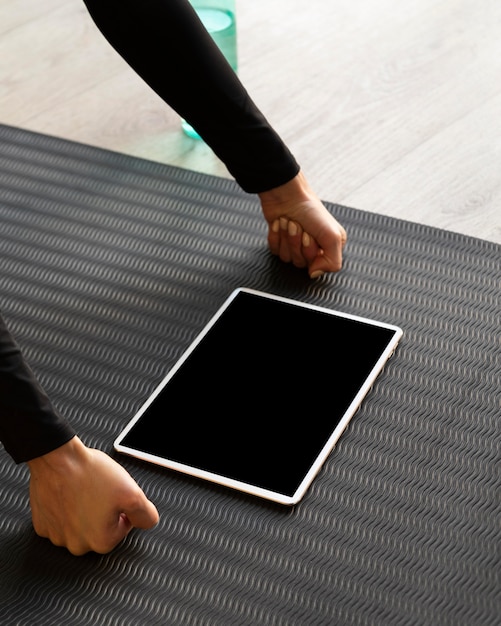 Close-up fists standing with tablet