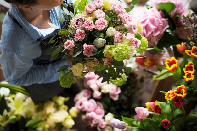 Close up florist flower arrangement skill