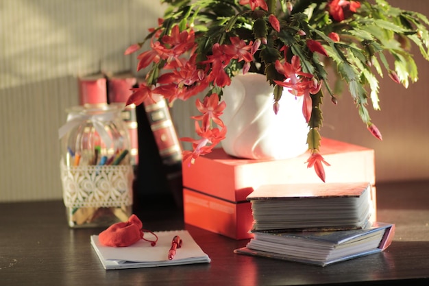 Close-up of flower vase on table at home