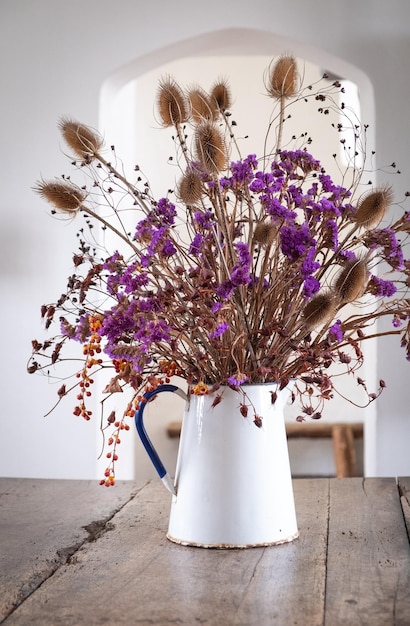 Photo close-up of flower vase on table at home