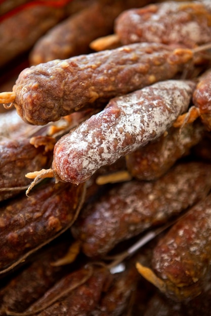 Close up of French sausages on a market stall