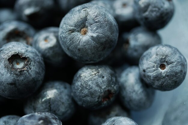 Close up of fresh blue berry with water drops