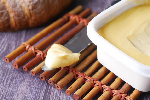 Close up of fresh butter in a container