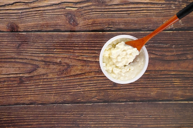 Close up of fresh feta cheese on spoon