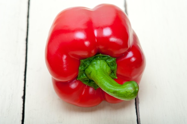 Close-up of fresh red bell pepper on table