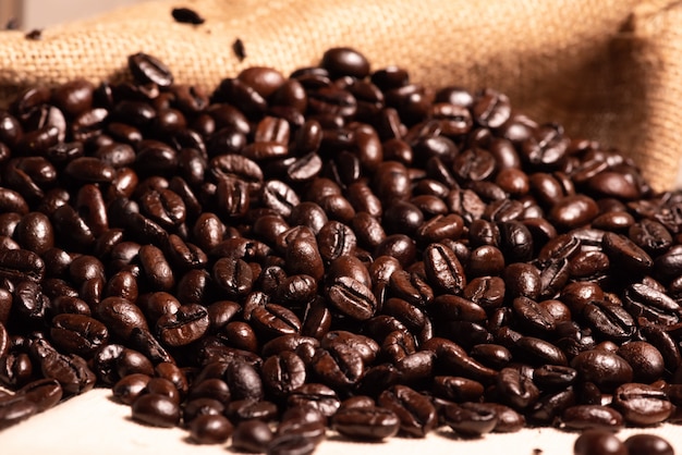 Close-up fresh roasted coffee beans in brown sack