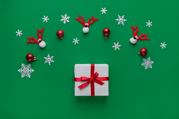 Close up gif box on green background Christmas and New year